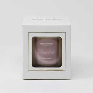unwind candle in gift box from the relax collection - vanilla and orange