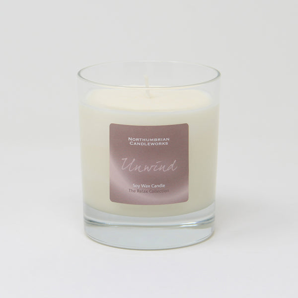 unwind candle from the relax collection - vanilla and orange