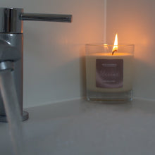 Load image into Gallery viewer, unwind candle from the relax collection - lit with bubble bath
